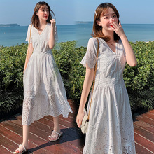 沙滩裙2024新款超仙巴厘岛白色海边旅游连衣裙马尔代夫显瘦遮肉裙