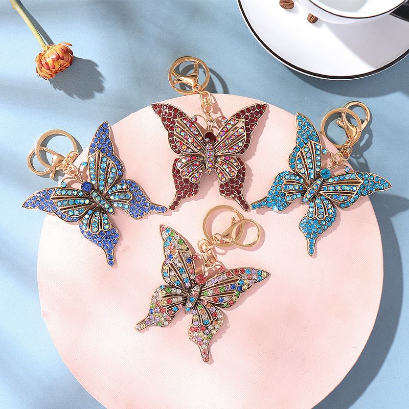 Cross-Border Color Diamond Studded Hollow Butterfly Metal European and American Keychain Pendant Little Creative Gifts Handbag Pendant in Stock