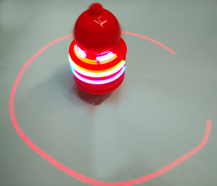 卡通公仔头不倒红外线陀螺