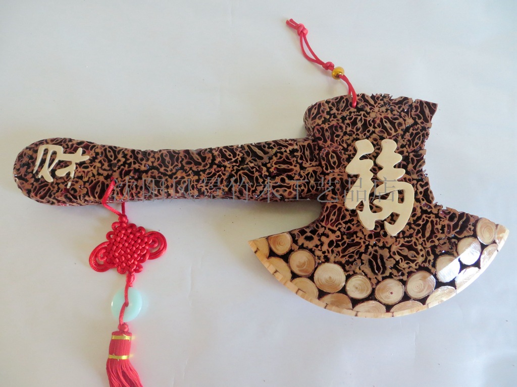 一,产品名称:长白山核桃皮开山斧头3号(如意龙把) 二,产品规格:45cm*