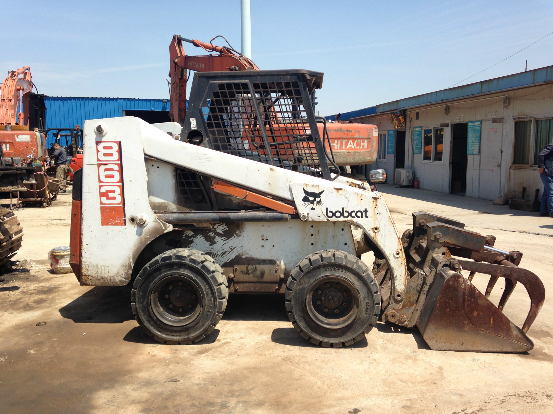 美国bobcat山猫863滑移装载机出售.配清扫器.铣刨机.开沟机