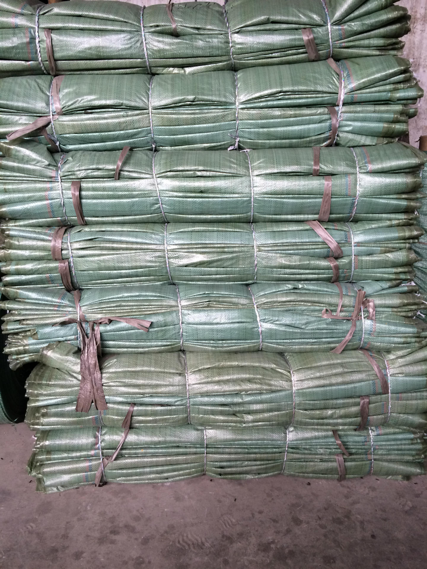 绿色复膜防水pp编织袋100133物流快递物流打包蛇皮袋厂家直销