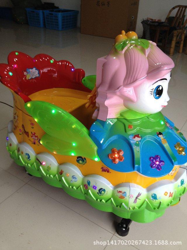 厂家直销特价最新款塑料电动七彩灯光投币画屏花仙子摇摇车摇摆机