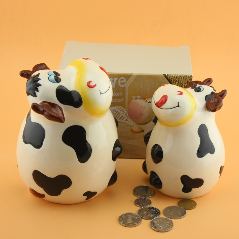 批发陶瓷储钱精典奶牛存钱罐陶瓷手工彩绘奶牛储钱罐儿童生日礼
