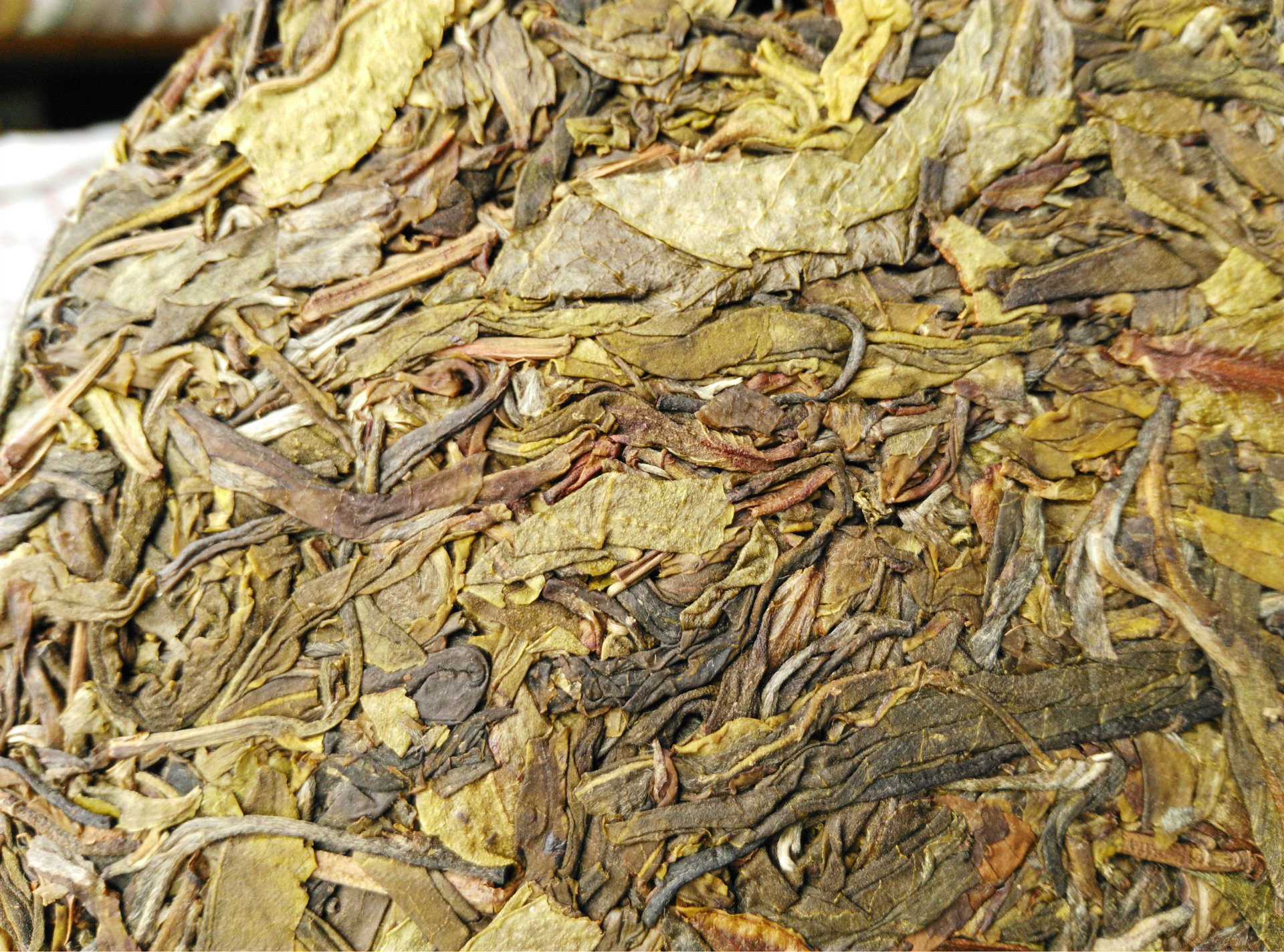 黄金叶普洱茶生茶云南七子饼茶叶生饼茶15年357克勐海