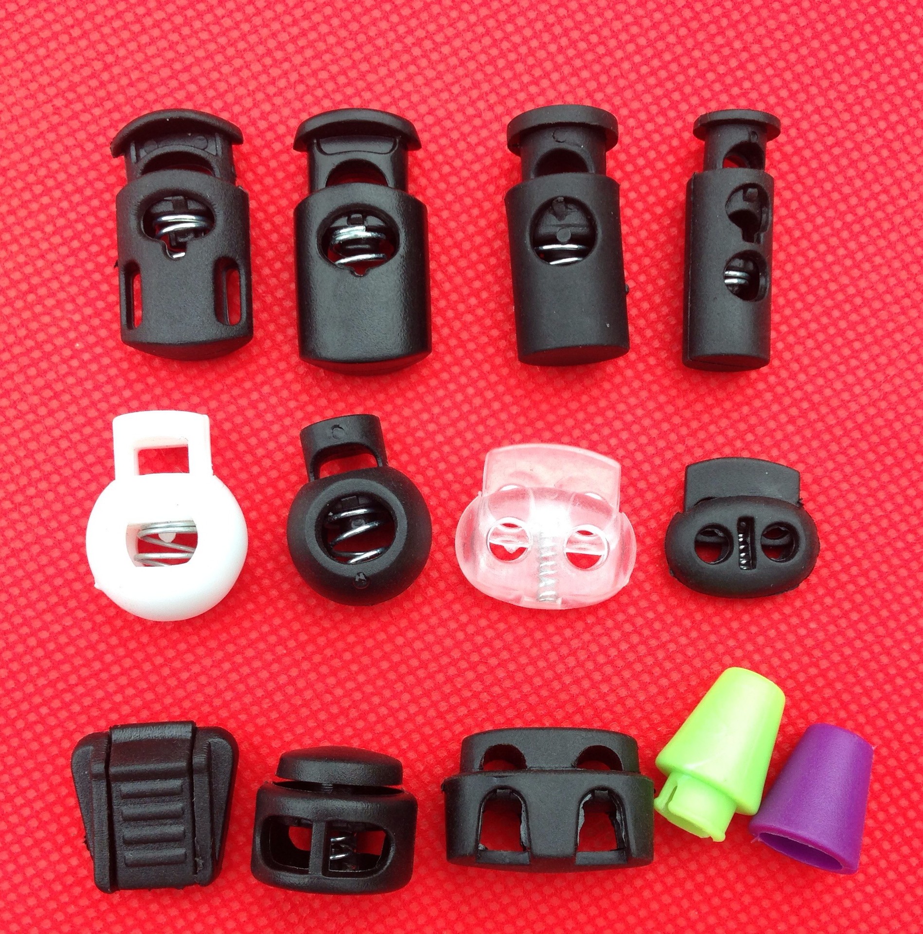 现货供应塑料弹簧扣 双孔绳扣 双眼调节 扣双孔圆柱 黑色现货