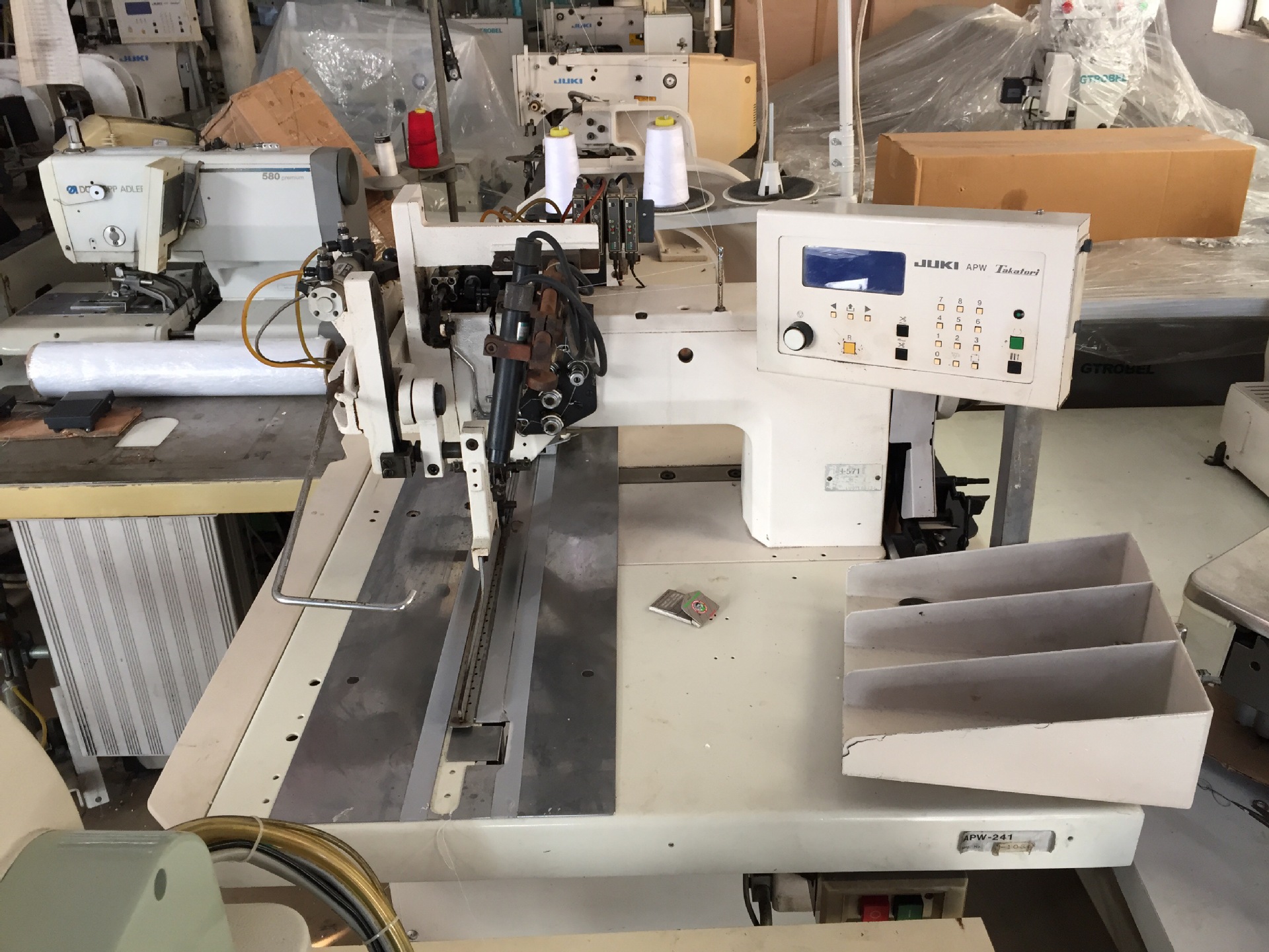 供应二手九成新原装进口重机195n开袋机 各种服装缝纫设备