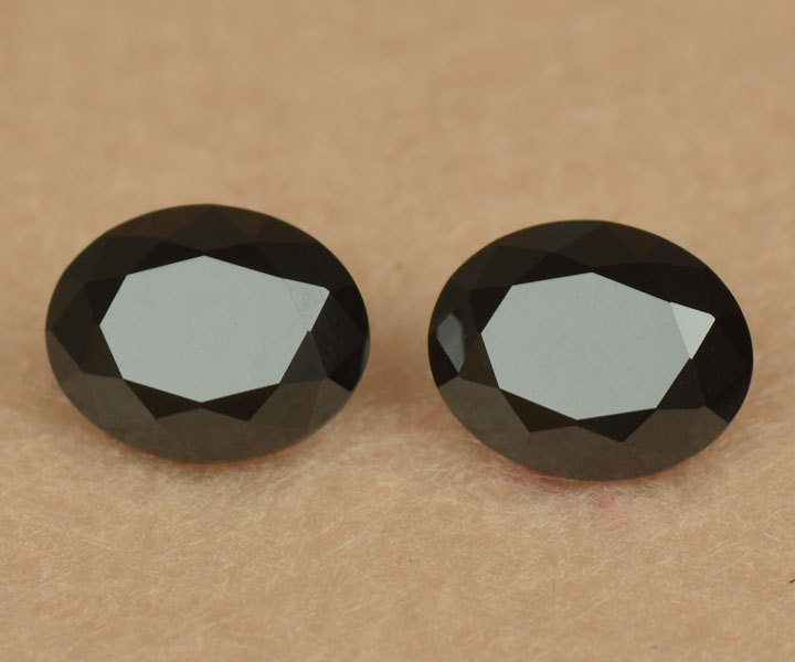 厂家直销广西梧州宝石价格 3a蛋形旦形黑色天然黑尖晶石裸石