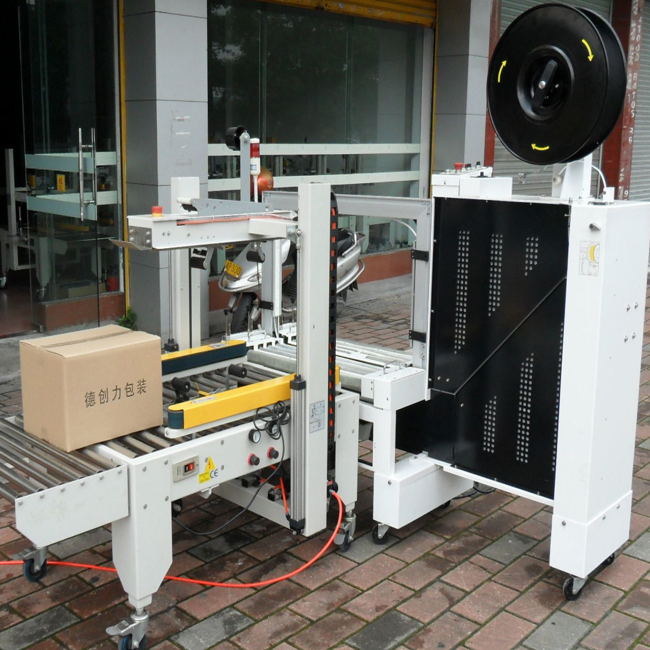 德创力自动打包机广州全自动打包机无人化全自动打包机纸箱打带机
