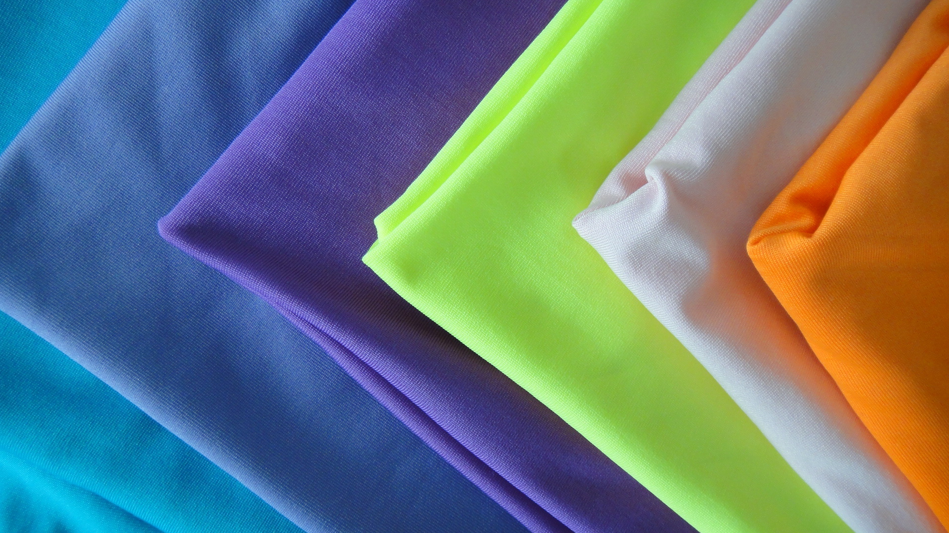 现货供应牛奶丝四面弹针织面料 涤氨四面弹 针织牛奶丝 量大从优