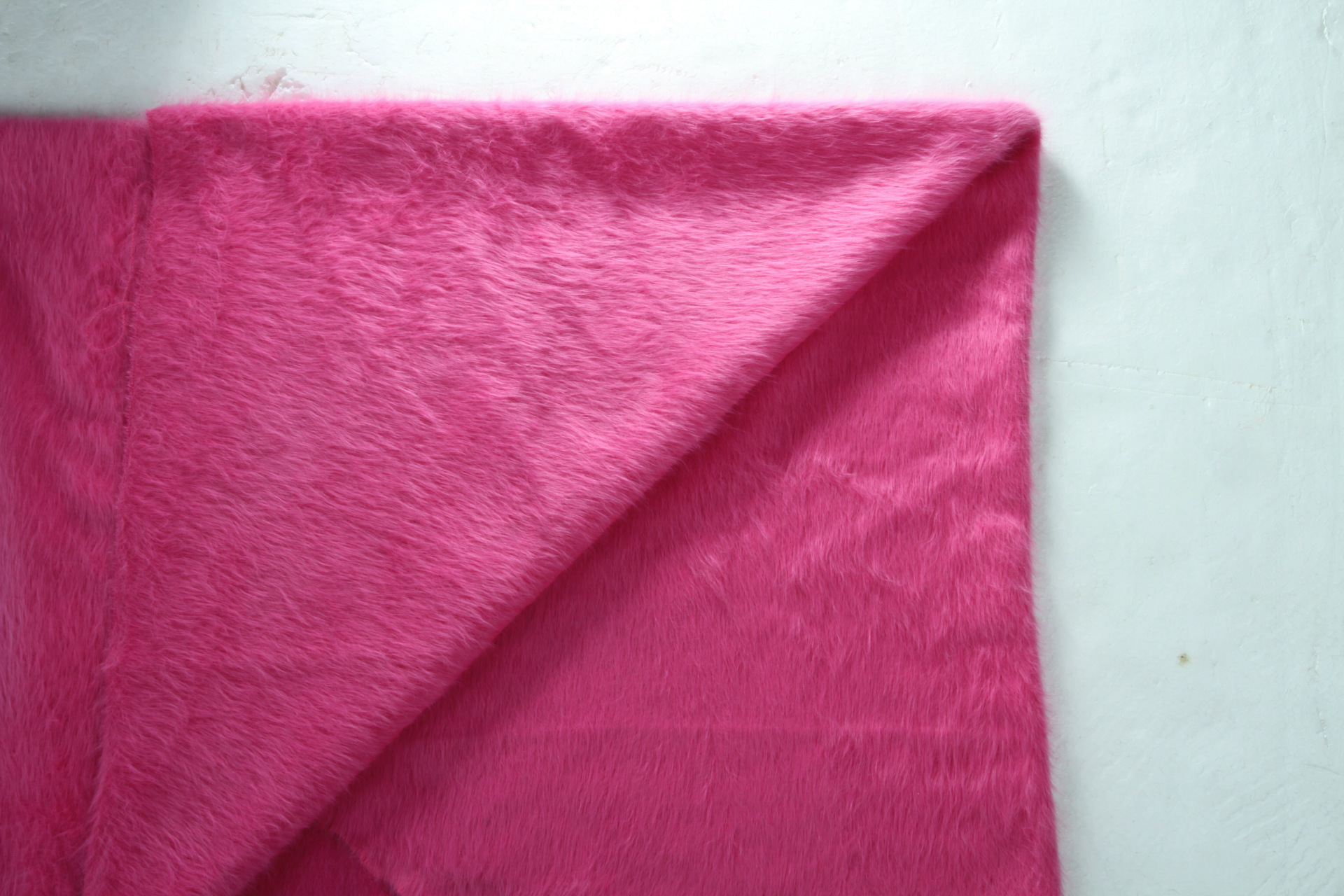 现货批发新型兔毛粗纺绒布毛衣布料 秋冬季女装高档外套面料