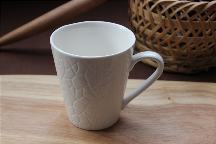 厂家批发 现货象牙白新骨瓷浮雕杯 陶瓷杯马克杯 促销礼品陶瓷杯