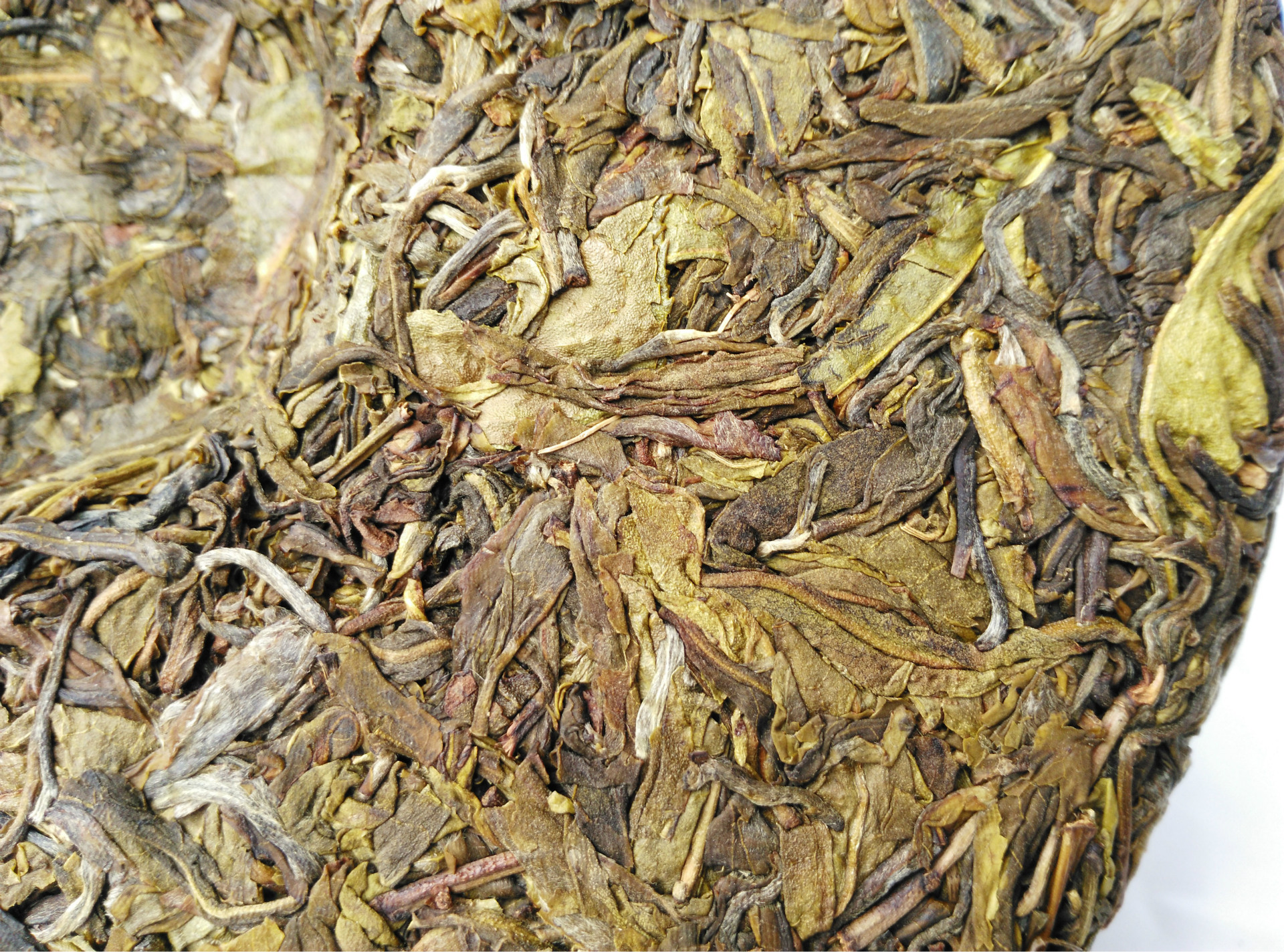 黄金叶普洱茶 生茶 云南七子饼茶叶生饼茶15年357克勐海.