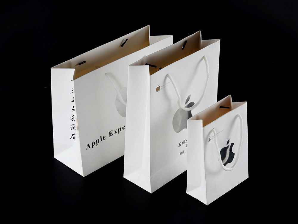 厂家直销 手机数码包装袋 牛皮纸 白卡纸袋 手提服装袋 纸袋定做