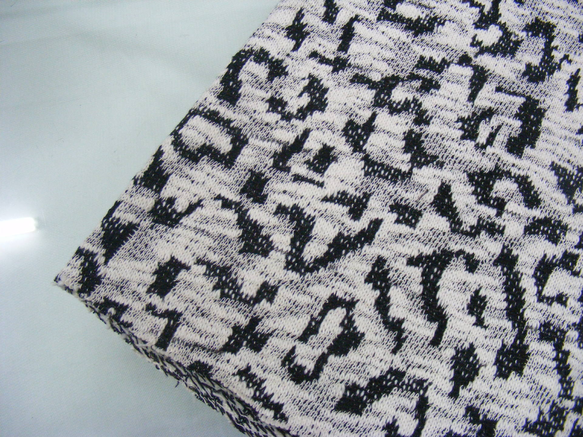 针织粗针提花面料 cvc豹纹花型单面提