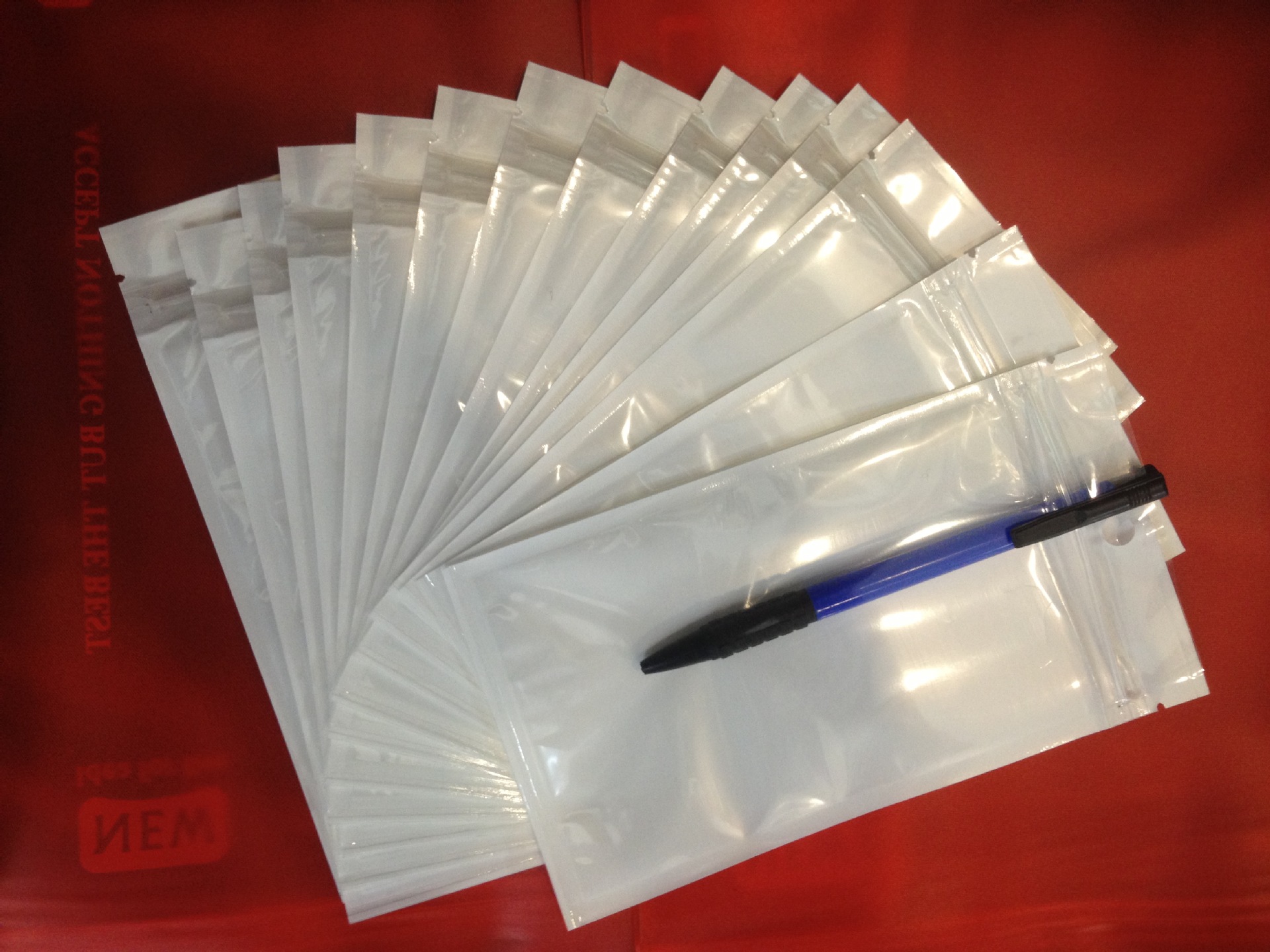 18x25白色包装袋 通用阴阳珠光上骨袋 数码手机配件自封.