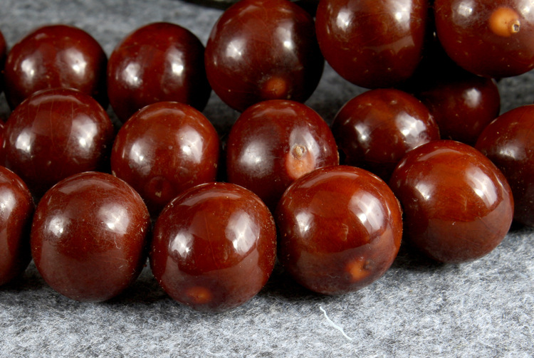 天然太阳菩提籽 红皮精抛光 太阳子108颗长串佛珠 打孔散珠批发
