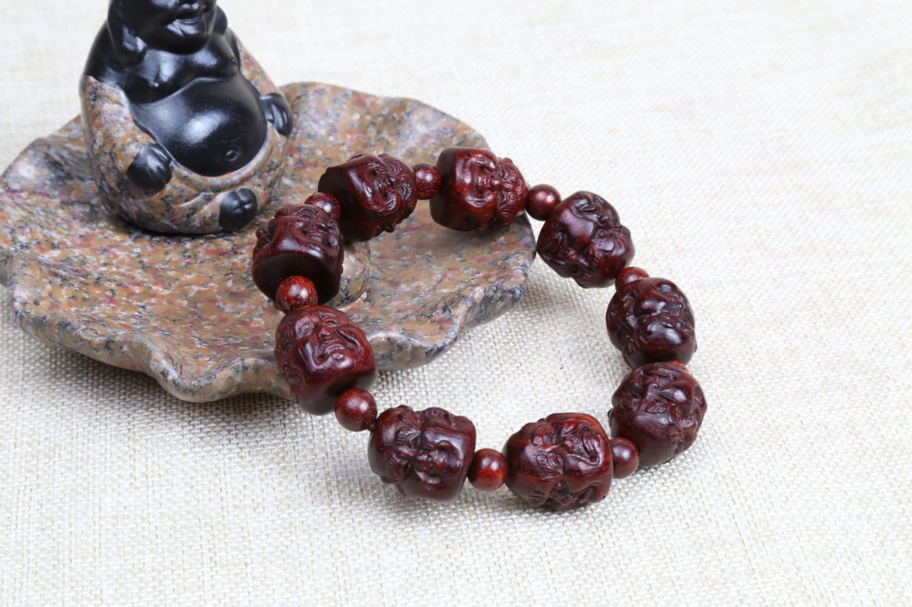 星云厂家 印度小叶紫檀四面佛手串手工雕刻喜怒哀乐佛珠文玩饰.