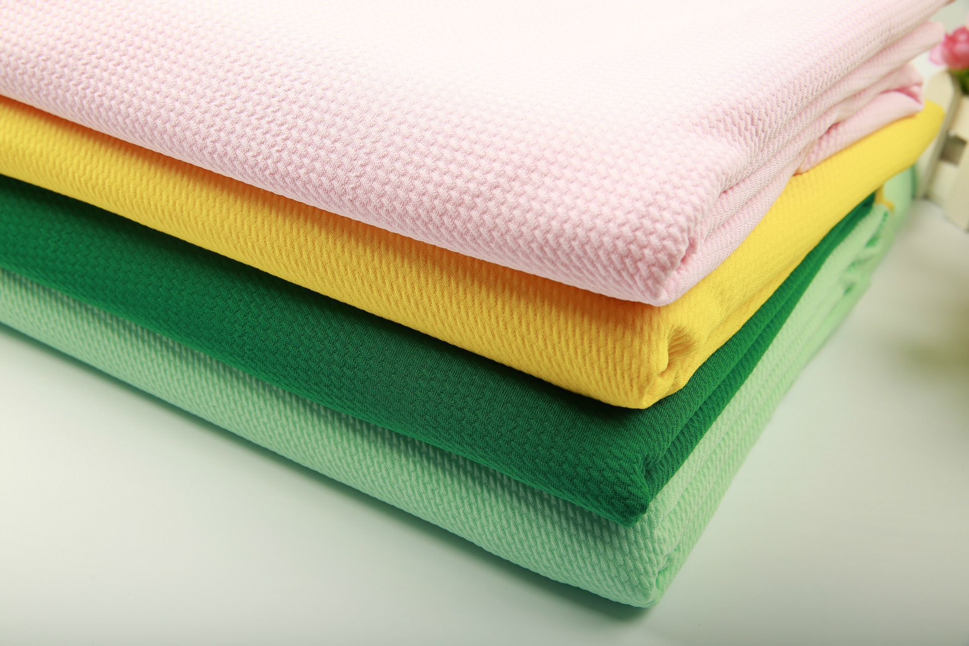 斜纹泡泡布针织面料 高档裙子面料 弹力时尚童装面料厂家现