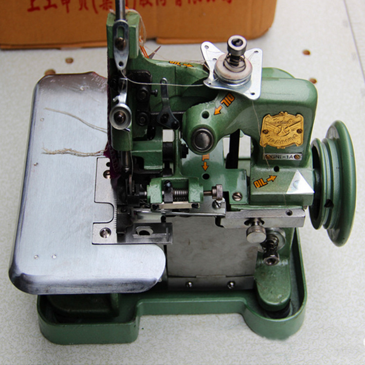 飞人gn1-1a中速三线包缝机 半自动家用缝纫机 电动锁边锁边机批发