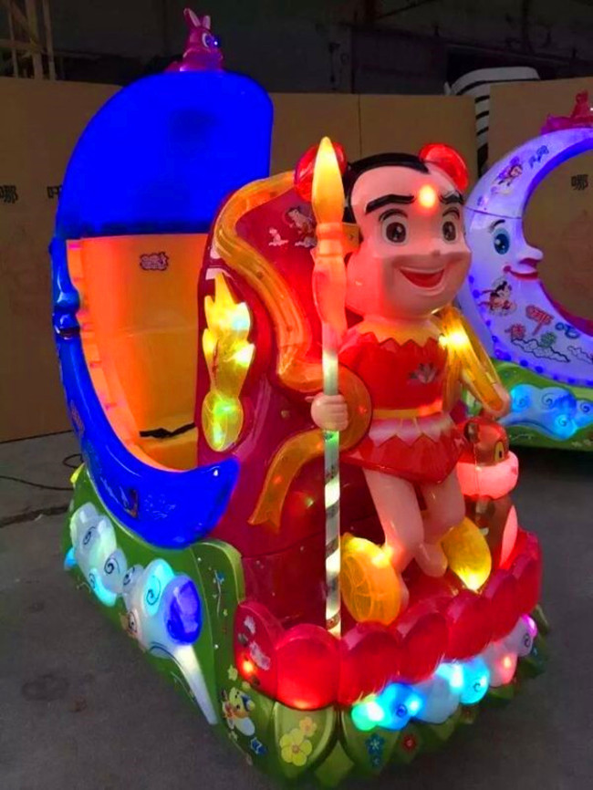 2015新款儿童投币哪吒传奇摇摇车 厂家直销电动月亮船摇摆机