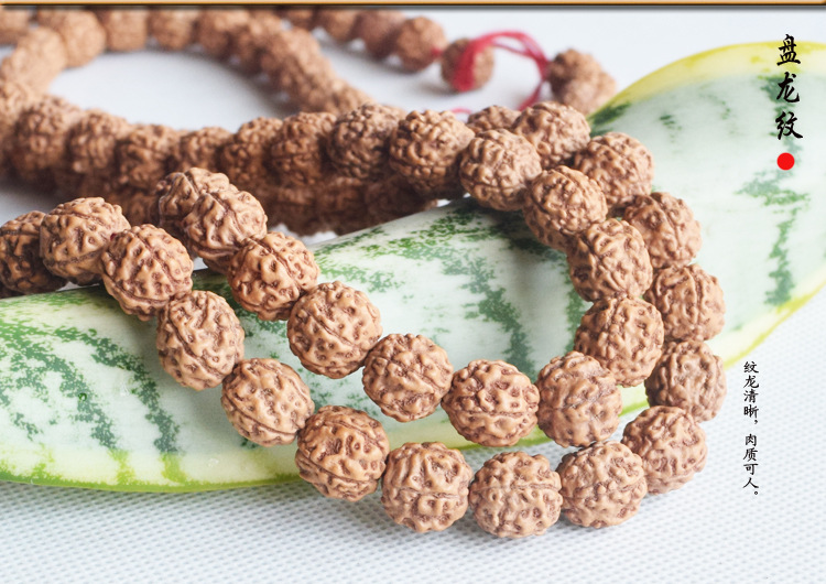 五瓣红皮圆桩二代盘龙纹小金刚菩提子108颗手持原桩新籽批发.