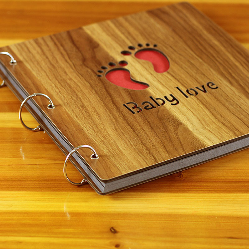 数量不同封面样式:铁环装 木质封面 图案多款内页纸张:黑卡纸相册厚度