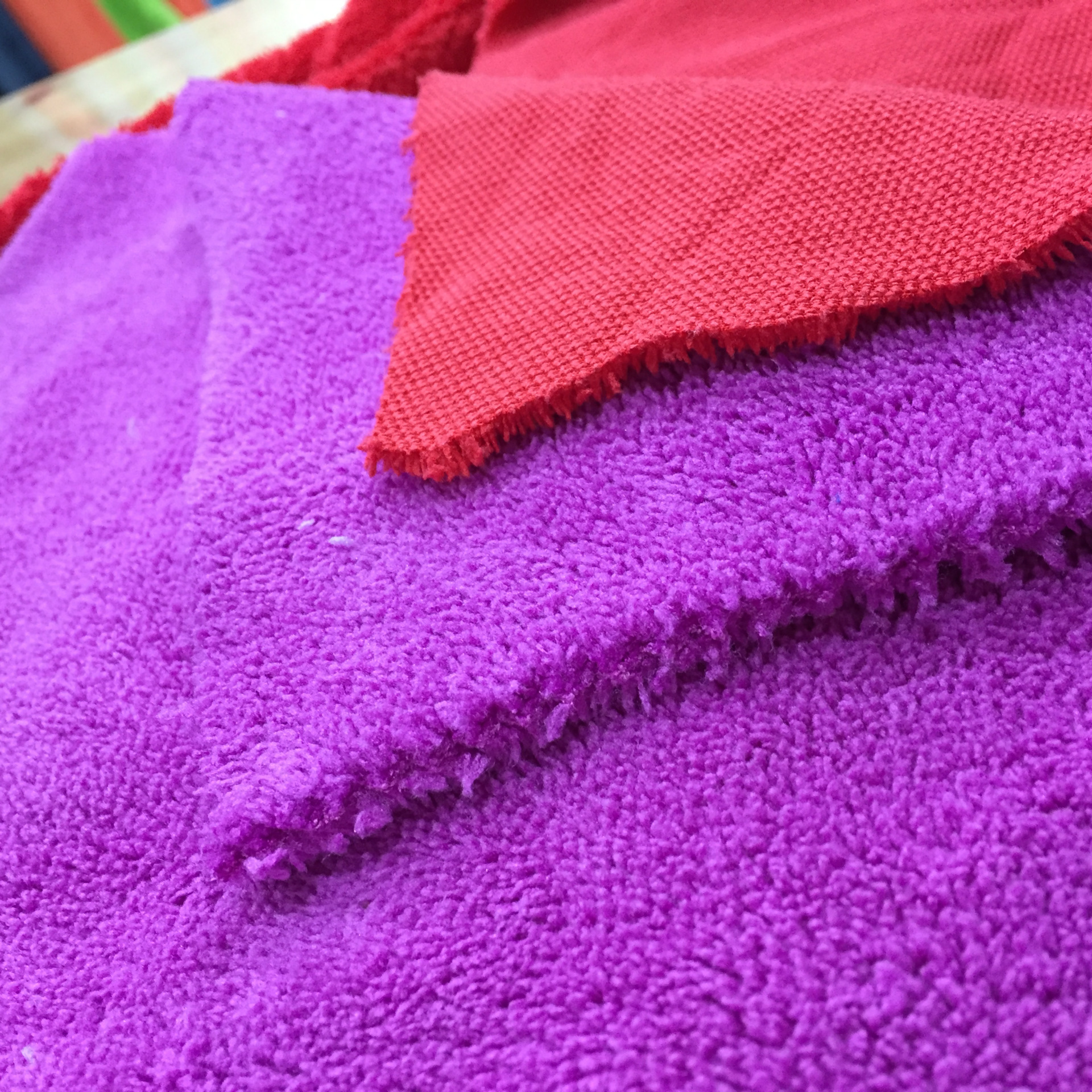 新品上市 涤锦珊瑚绒 经编单面长短毛珊瑚绒面料 可定制