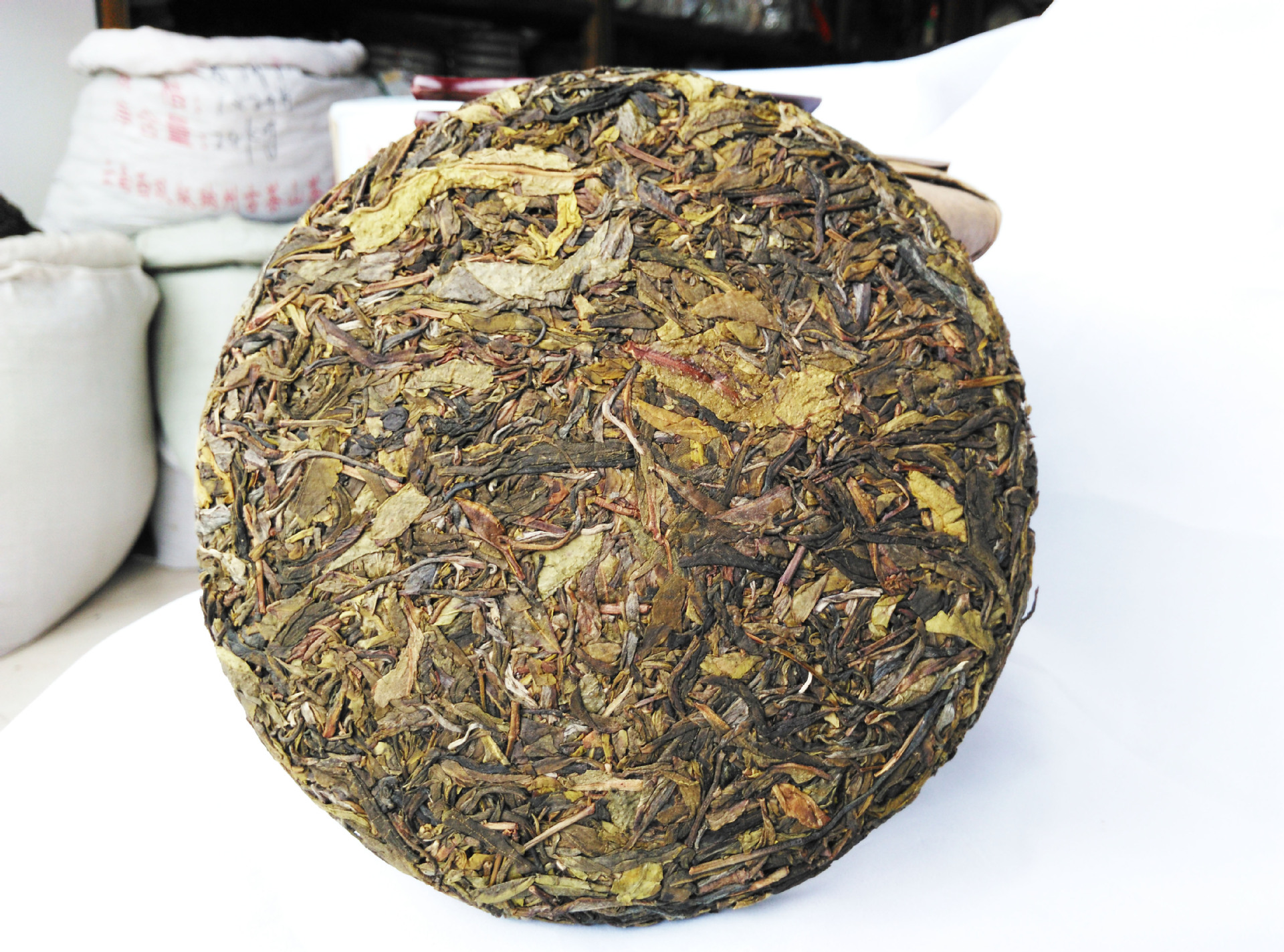 黄金叶普洱茶生茶云南七子饼茶叶生饼茶15年357克勐海