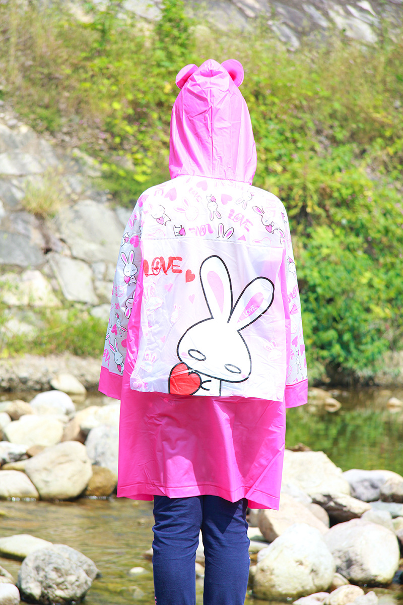 厂家直供天堂鸟2015爆款儿童充气帽檐卡通带书包位雨衣!儿童雨衣