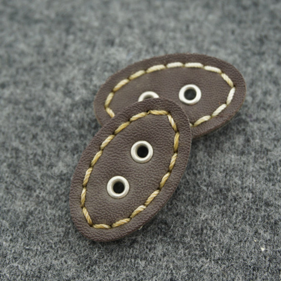 前黄纽扣椭圆形皮革纽扣手工纽扣批发