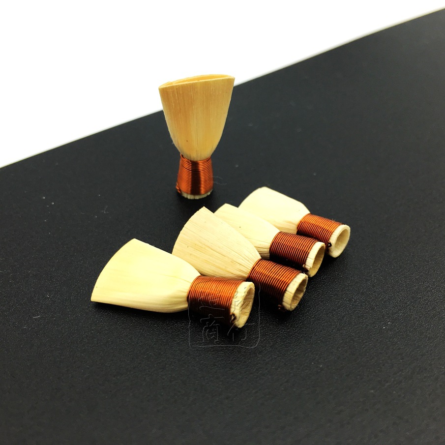 供应哨片嘴哨子芦苇叫子配件上海唢呐引子塑料哨片唢呐乐器配件