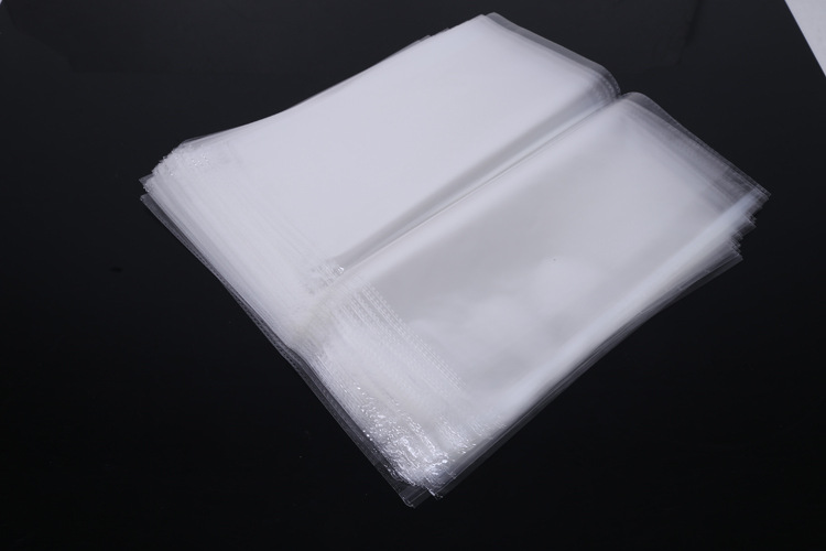 32x34x5丝包装袋 透明塑料袋 不干胶opp自粘自封.