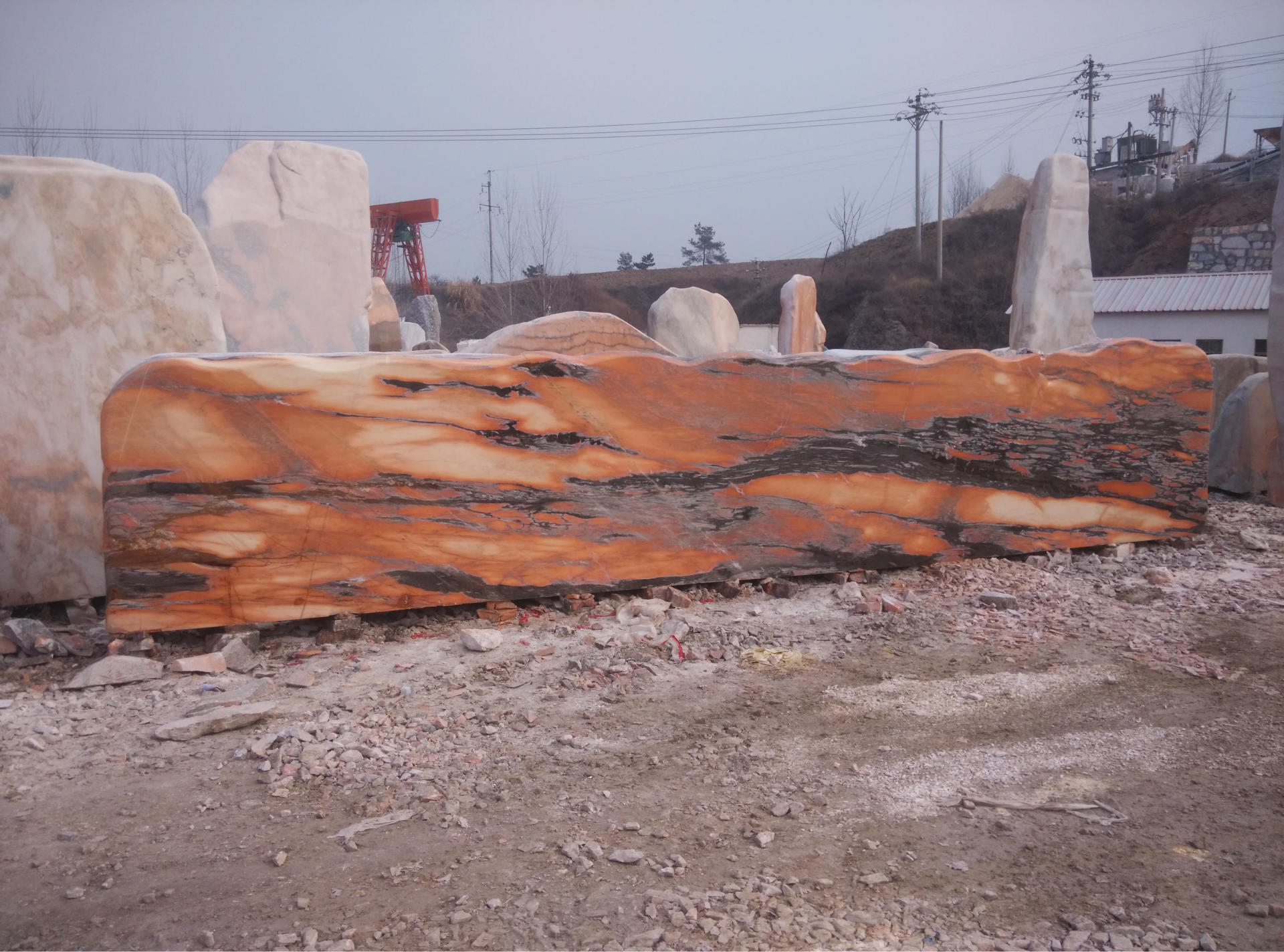 晚霞红景石 大型景观石厂家批发