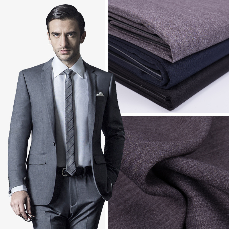 批发乱纹路tr化纤面料tr6535纯黑色面料 时尚西装服装裤装面料