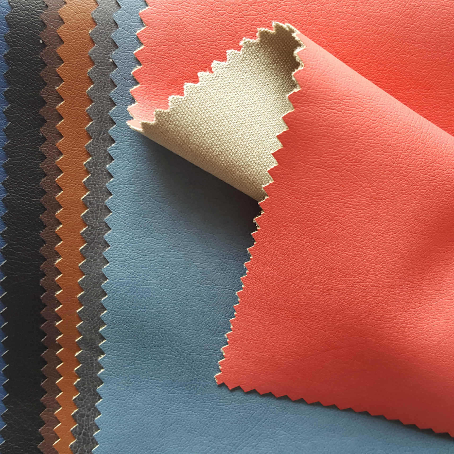 供应pu皮革面料 **服装pu面料 夹克衫pu皮面料 高端.