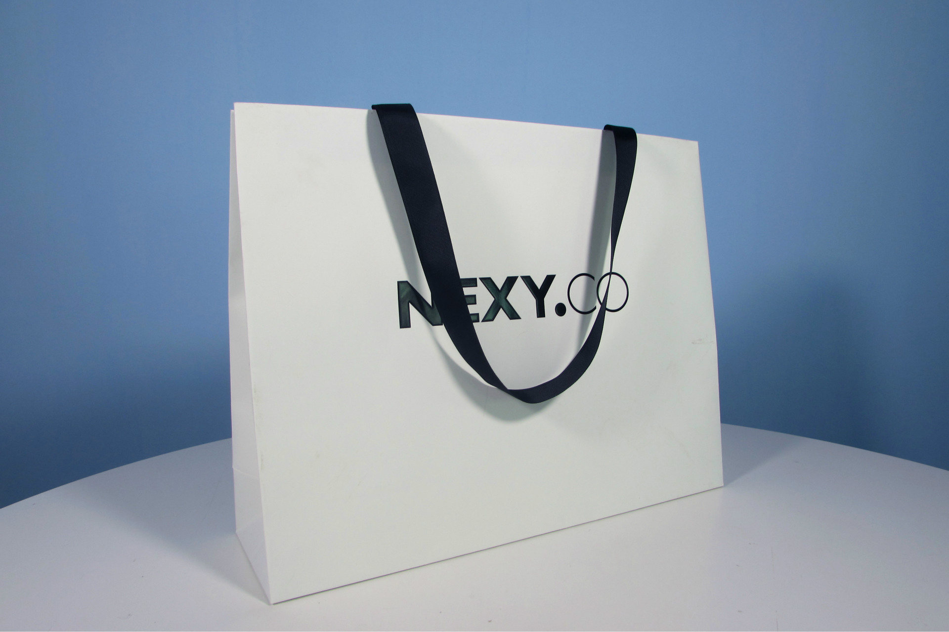 服装纸袋定做外贸购物礼品女装印刷手提袋logo设计包装袋