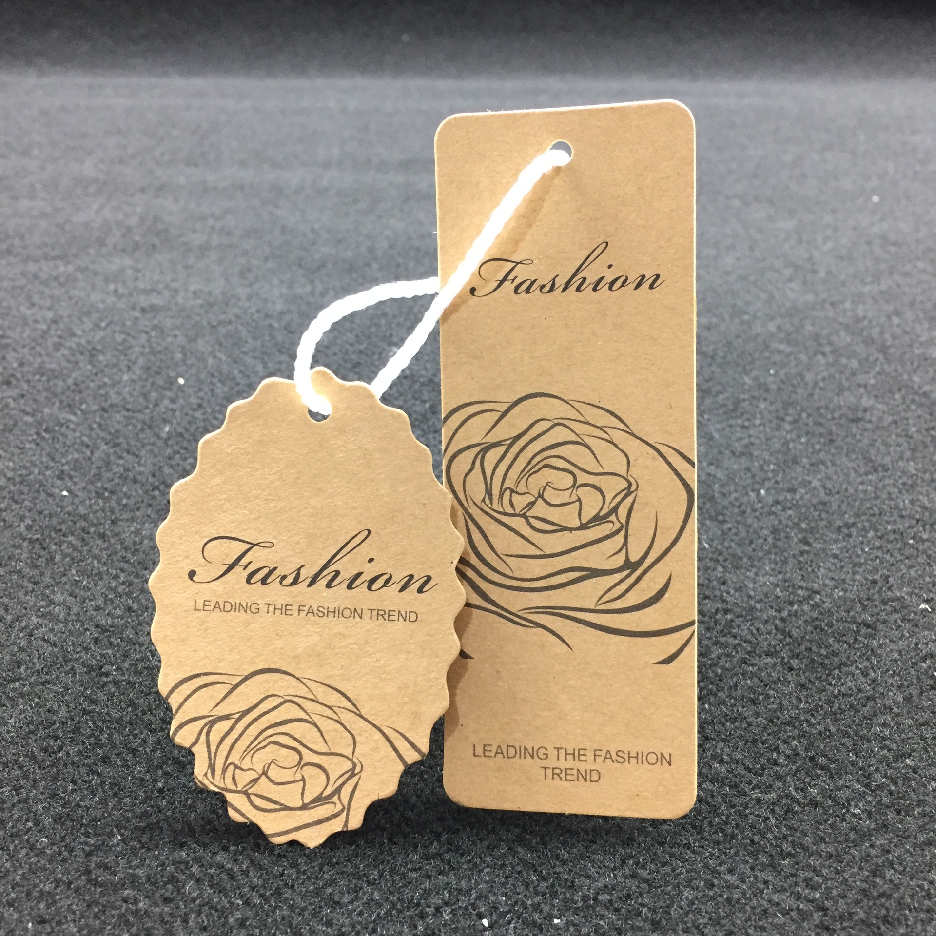 女装吊牌高档服装吊牌定做童装男装吊牌现货与订制牛皮纸吊牌