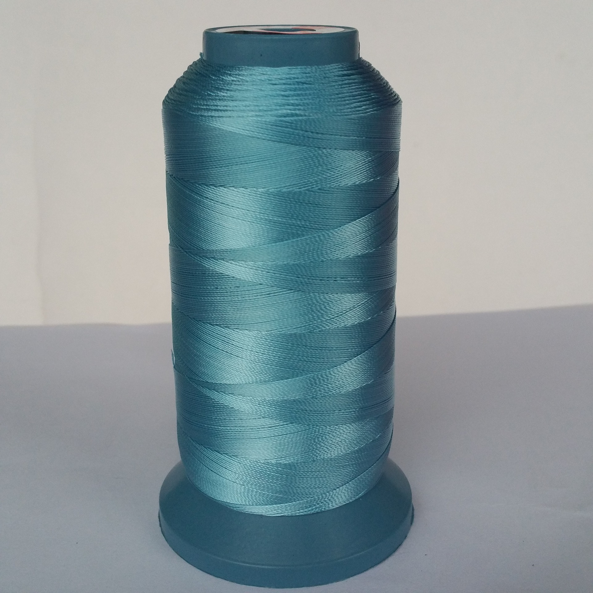 广州线厂现货250d/3高强缝纫线厂家直销3股30#尼龙线一心牌针车线