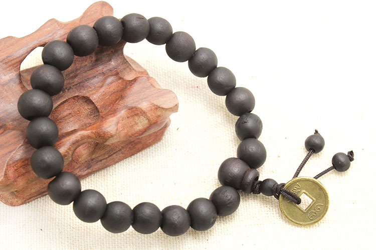 厂家直销10mm黑桃木铜钱佛珠手链佛教用品促销赠品桃木手串