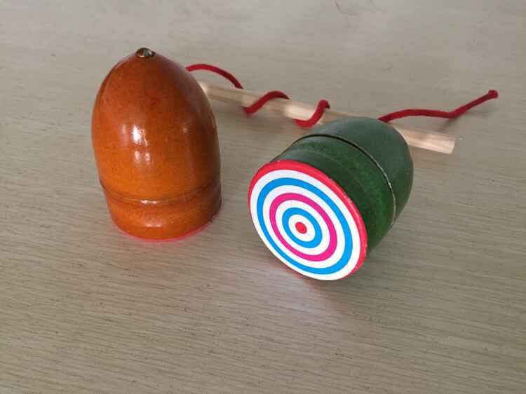 品名:单个大陀螺(大号)直径约9cm高11cm装箱数80