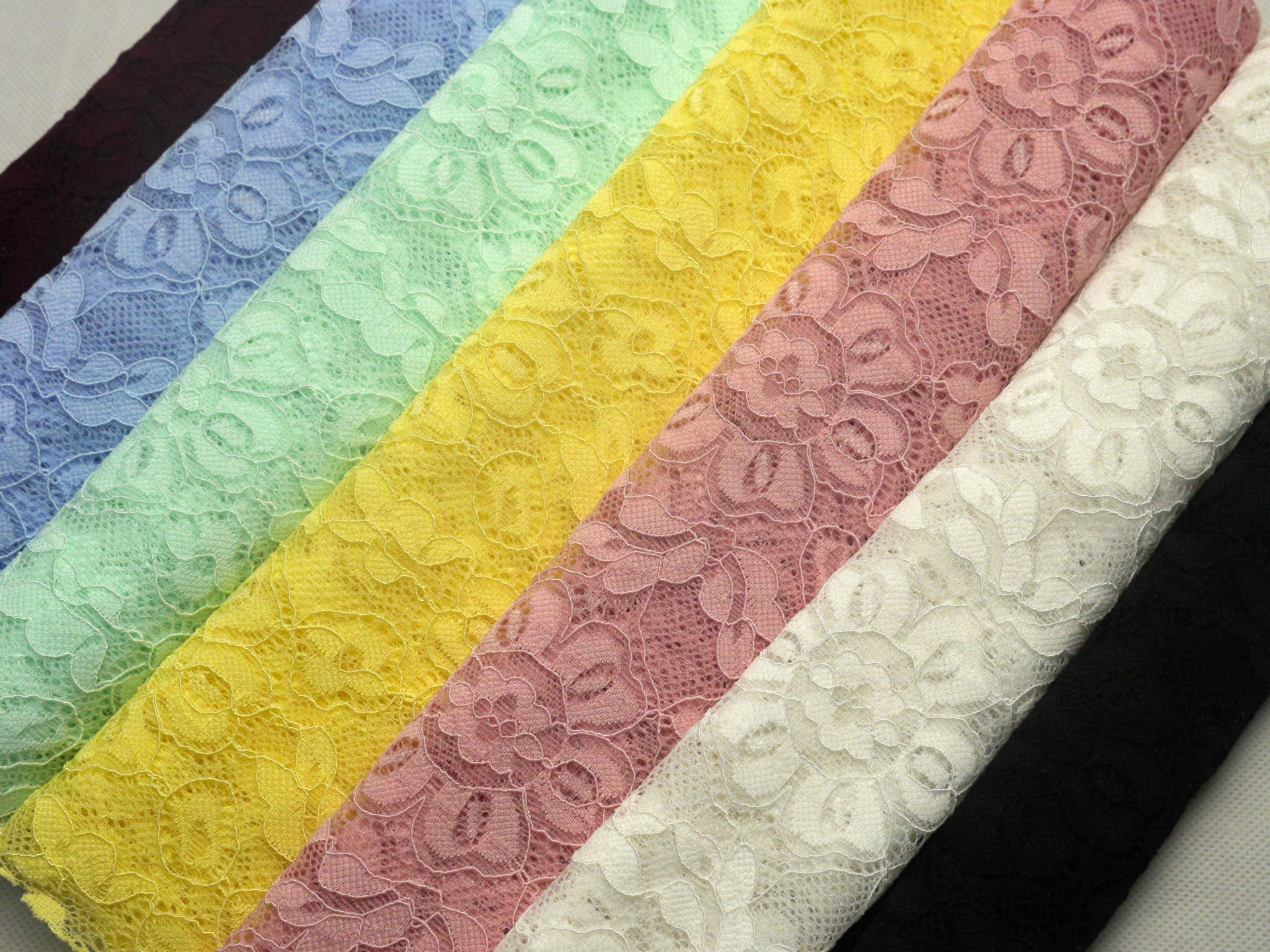 弹力锦纶蕾丝 镂空经编爆款面料 水溶花边女装布料现货批发