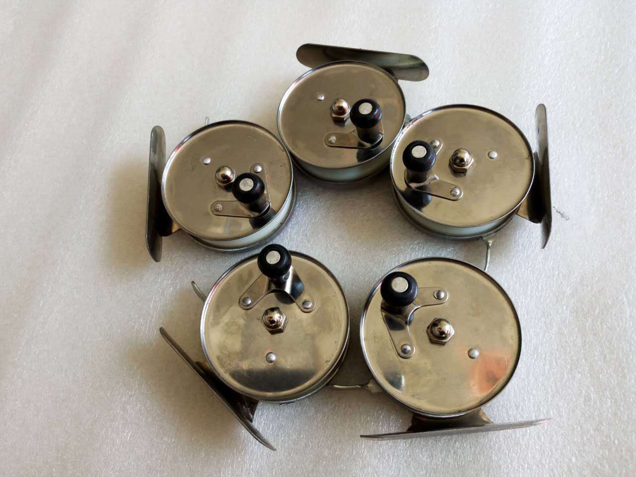 厂家供应渔轮冰钓轮铁制冬钓轮筏竿轮前打轮飞钓轮简易飞钓轮