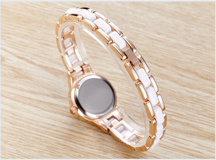 欧美时尚新款ebay流行金属手链学生女款水钻贝母表盘手表厂家批发