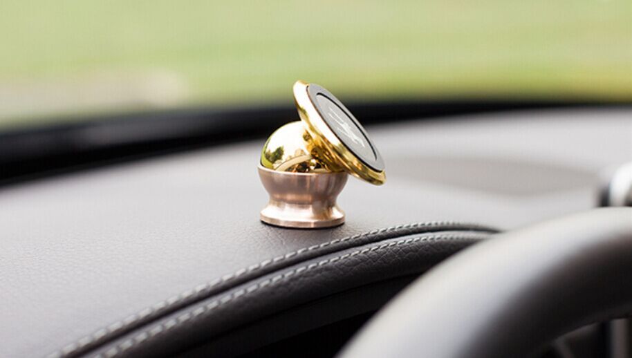 车载手机支架_24k金属车标性手机支架 360度