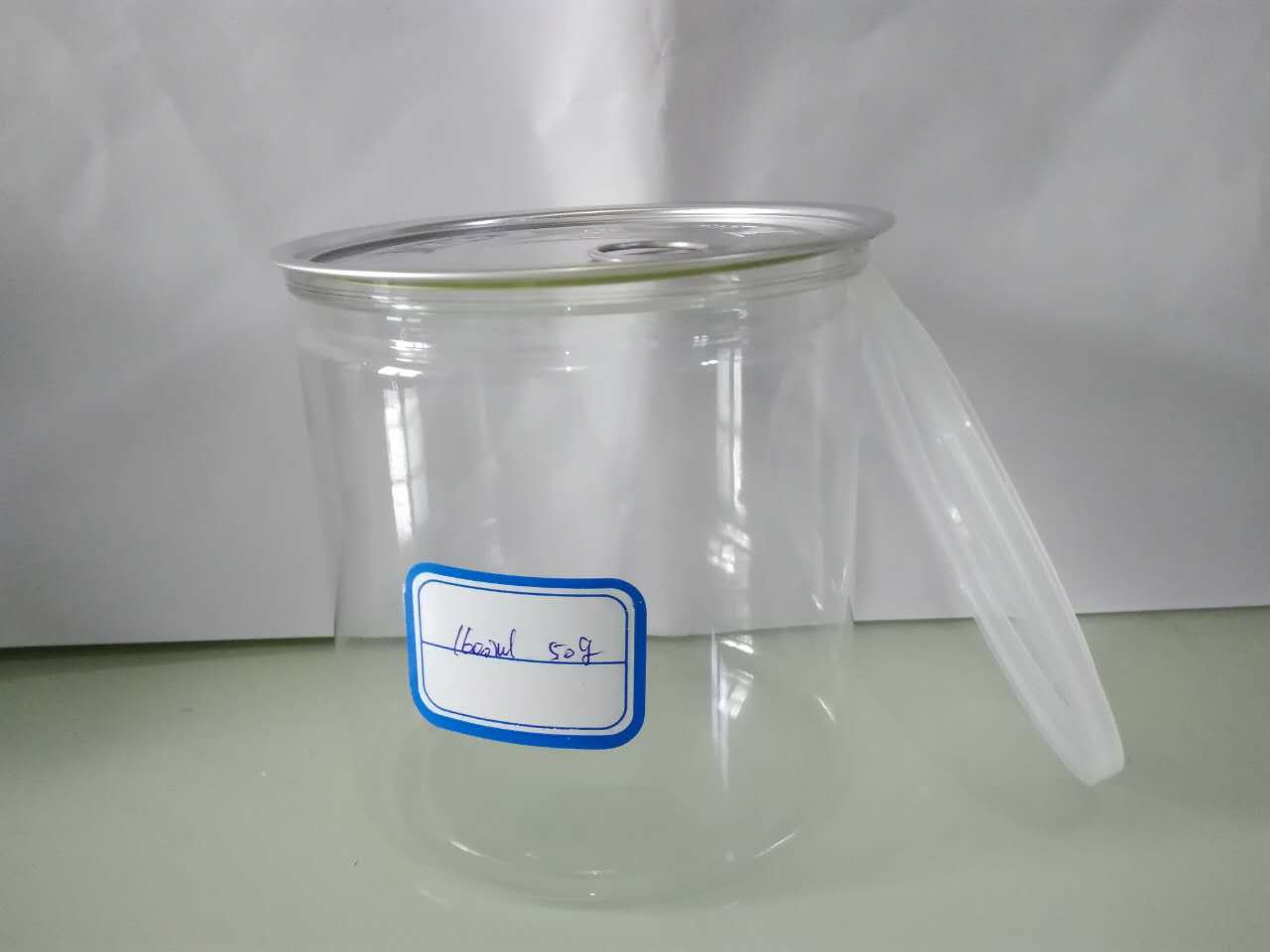 中国黄桃罐头交易网 黄桃罐头供应 山东直销透明易拉罐塑料罐食品包装