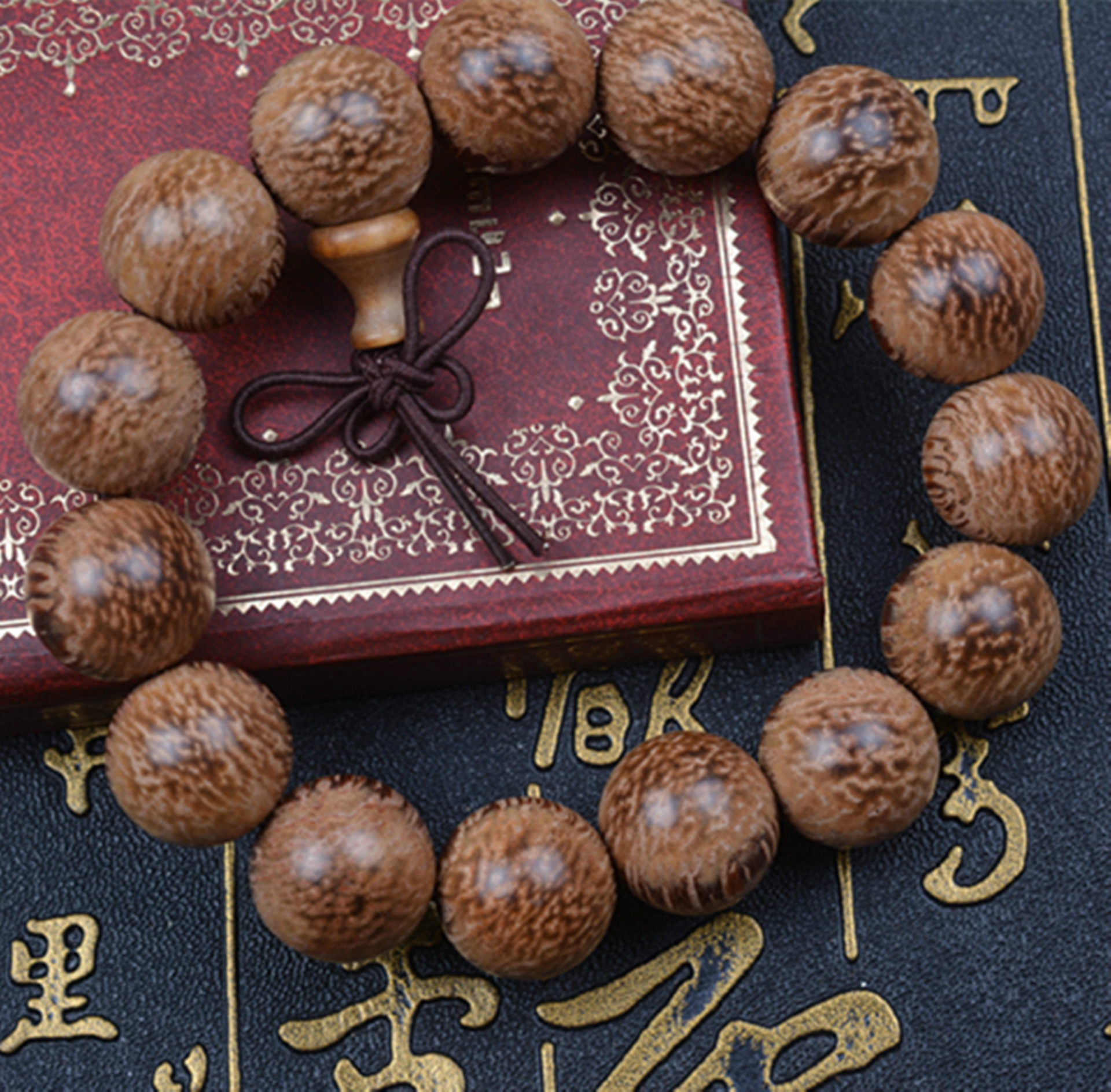 微店构成:如图所示材质:龙须木包装:10条一扎名称:龙须木手串珠径155