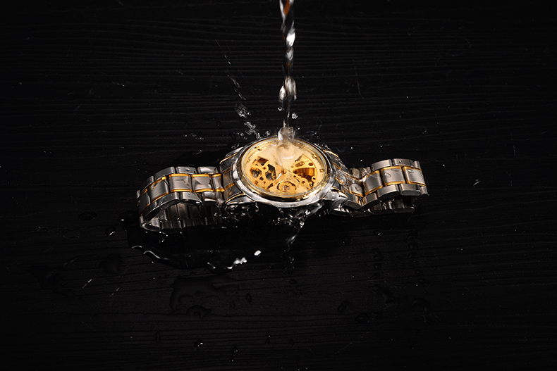 芬尊品牌幻彩金表l蓝光男士手表镂空全自动机械防水时装真皮男表