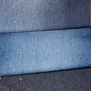 斜纹化纤无弹力 男装蓝色裤子面料 高档棉涤牛仔布厂家现货直销