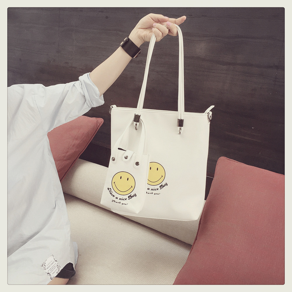 2016新款韩版休闲简易女包印花笑脸单肩手提韩版小清新包包水桶包